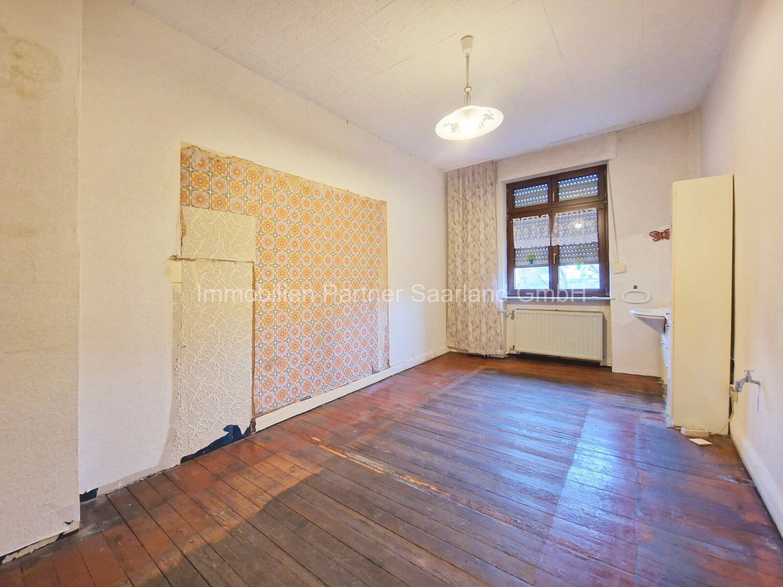 Renovierungsbedürftiges Reihenmittelhaus in VK