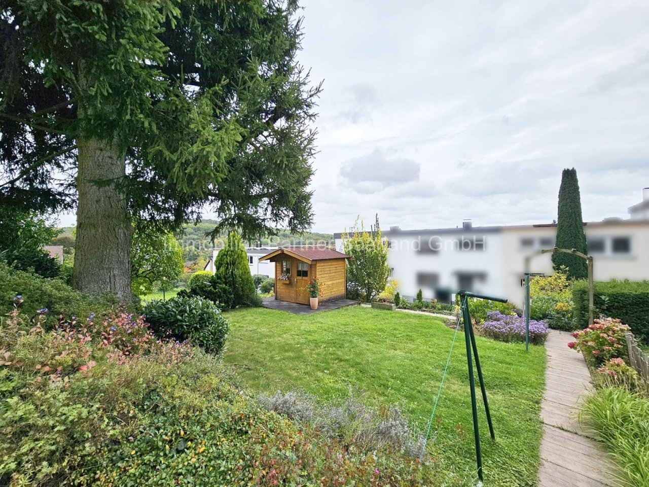 Reihenmittelhaus mit 2 Wohneinheiten in Toplage (2) — Garten